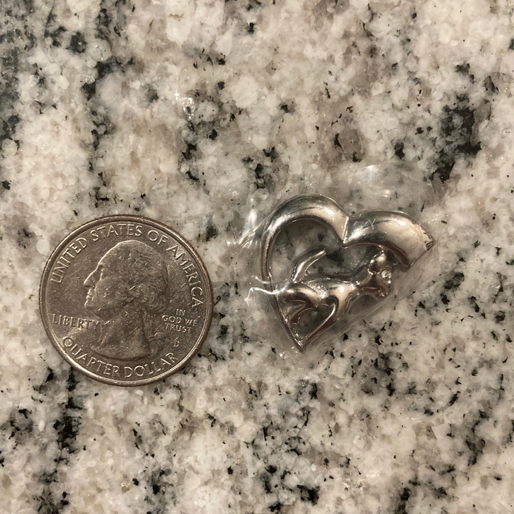 Small metal dog charm